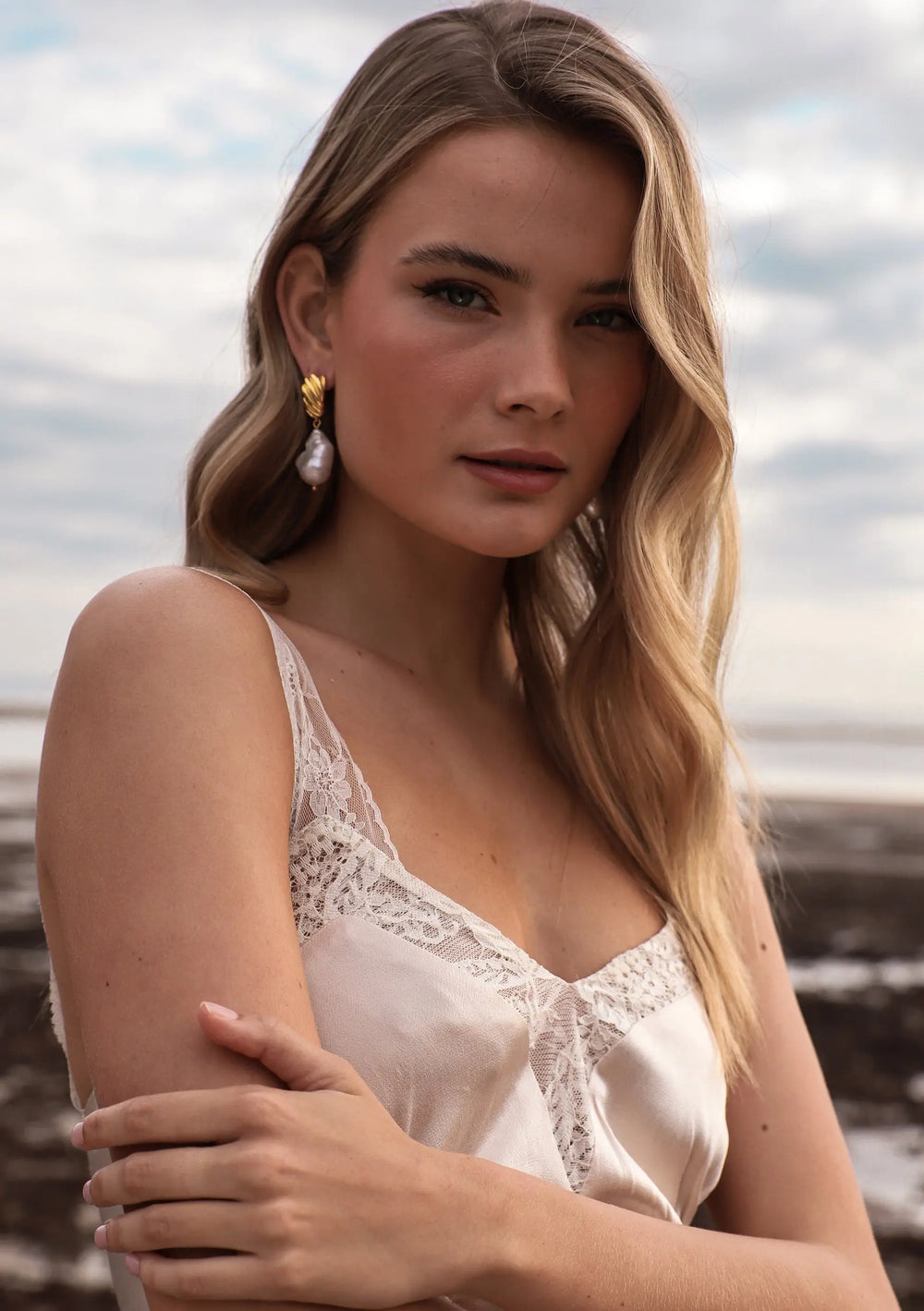 GOLD STATEMENT EARRINGS