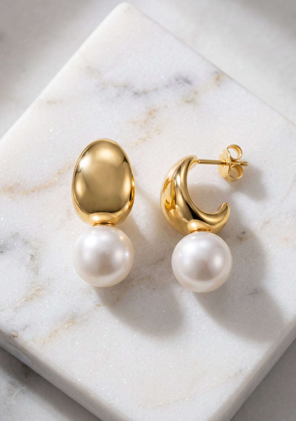 Stunning statement gold and pearl wedding earrings for the modern bride 