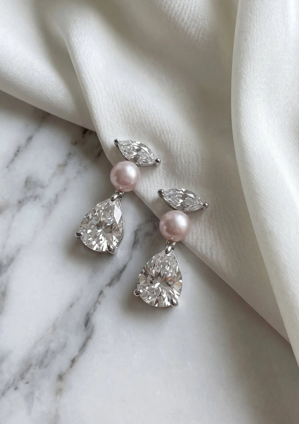 Estella silver bridal drop earrings with crystal and pearl detailing for modern brides by Lolaknight