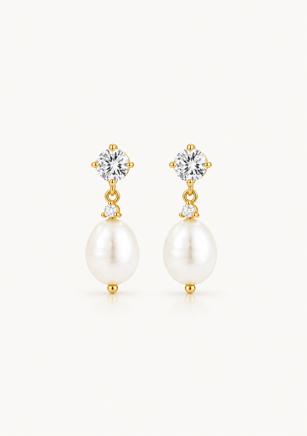 Modern pearl and crystal gold wedding earrings for the modern bride to be 