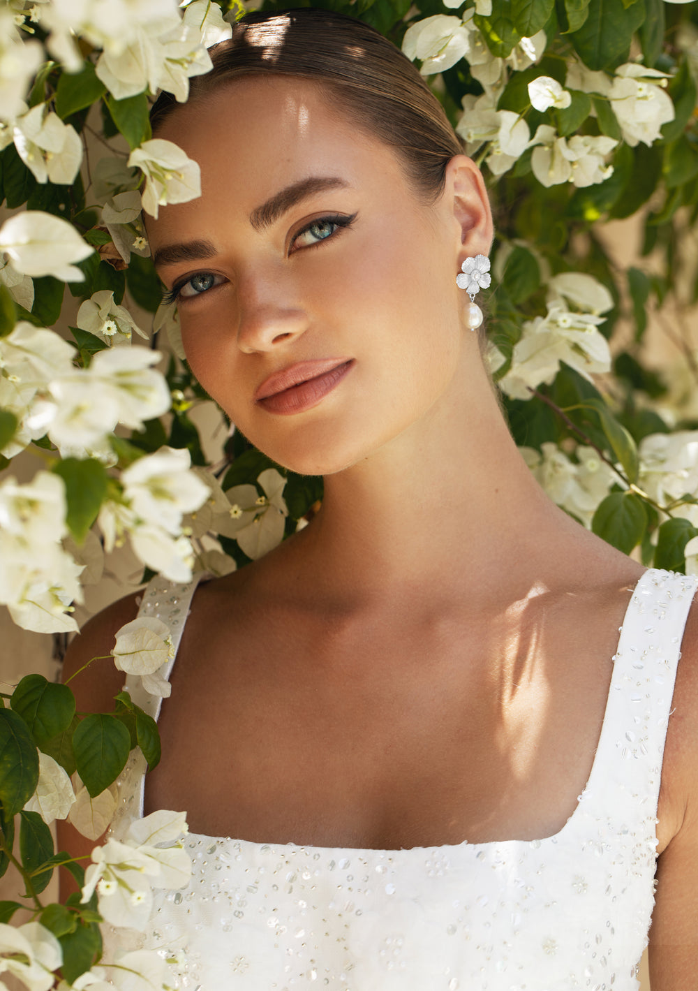 Luxury chic pearl and silver bridal earrings for the modern bride to be