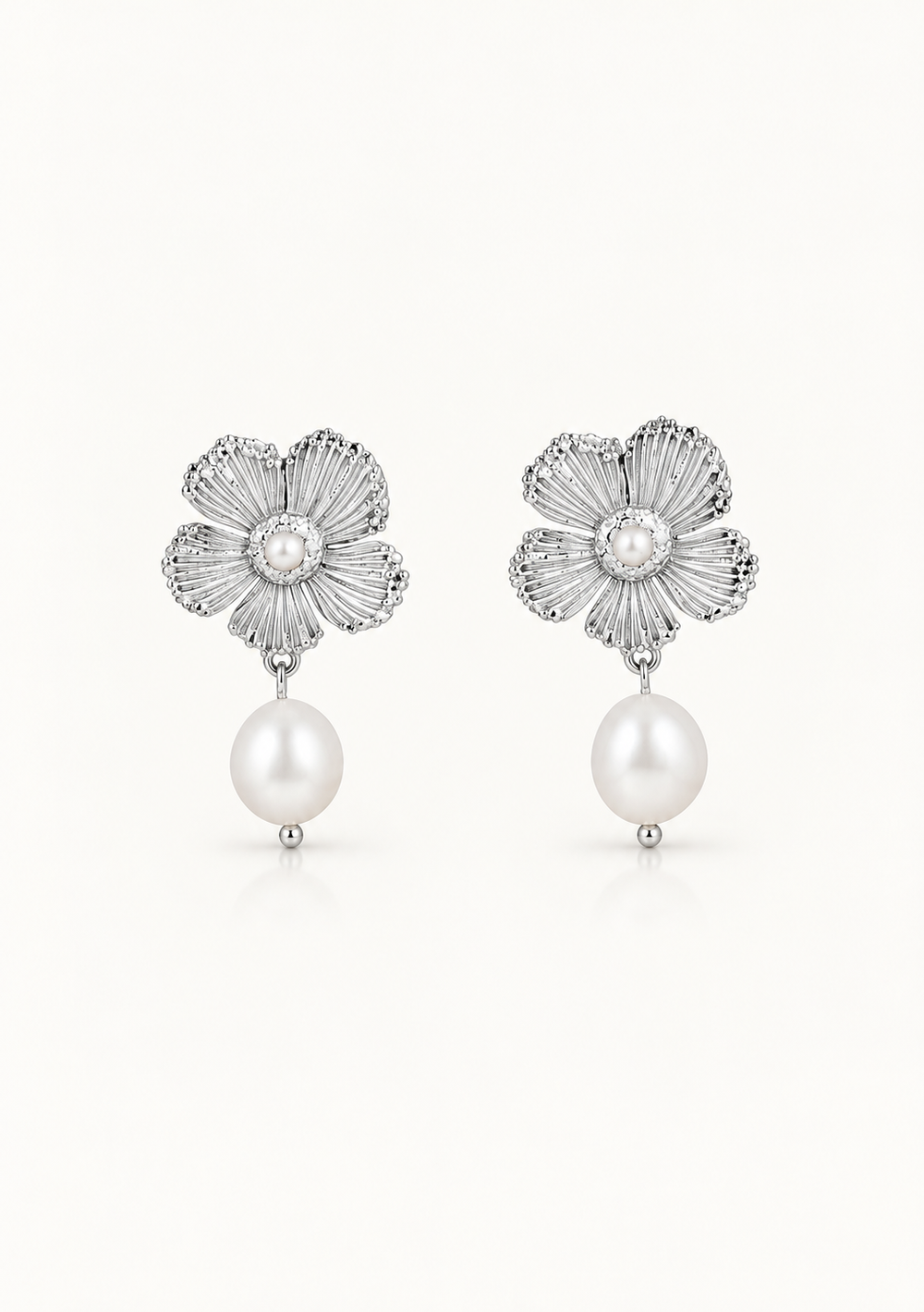 Stunning chic silver and pearl bridal earrings for the modern bride 