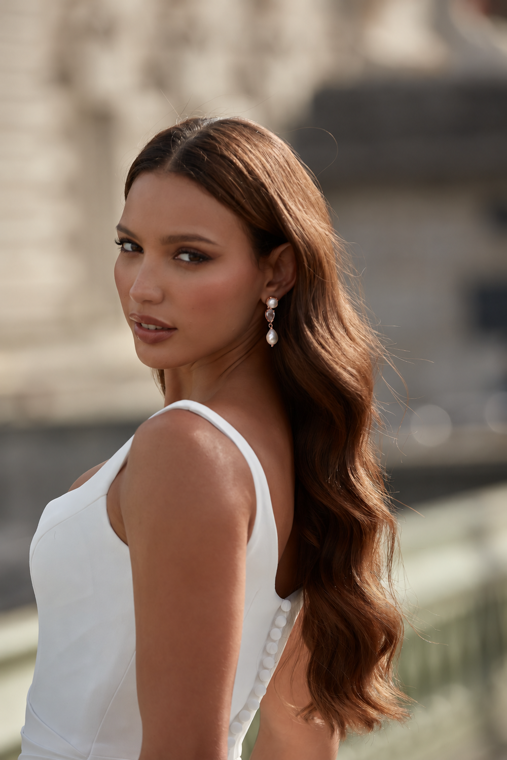 Luxury rose gold pearl crystal drop wedding earrings for the chic modern bride to be.