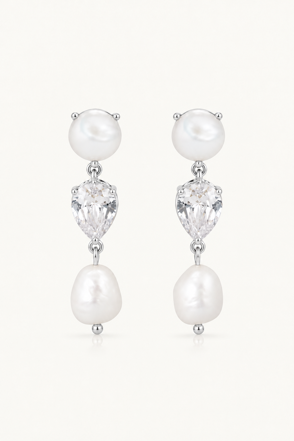Luxury chic pearl and pear cubic zirconia crystal. Designed for the modern bride to be.