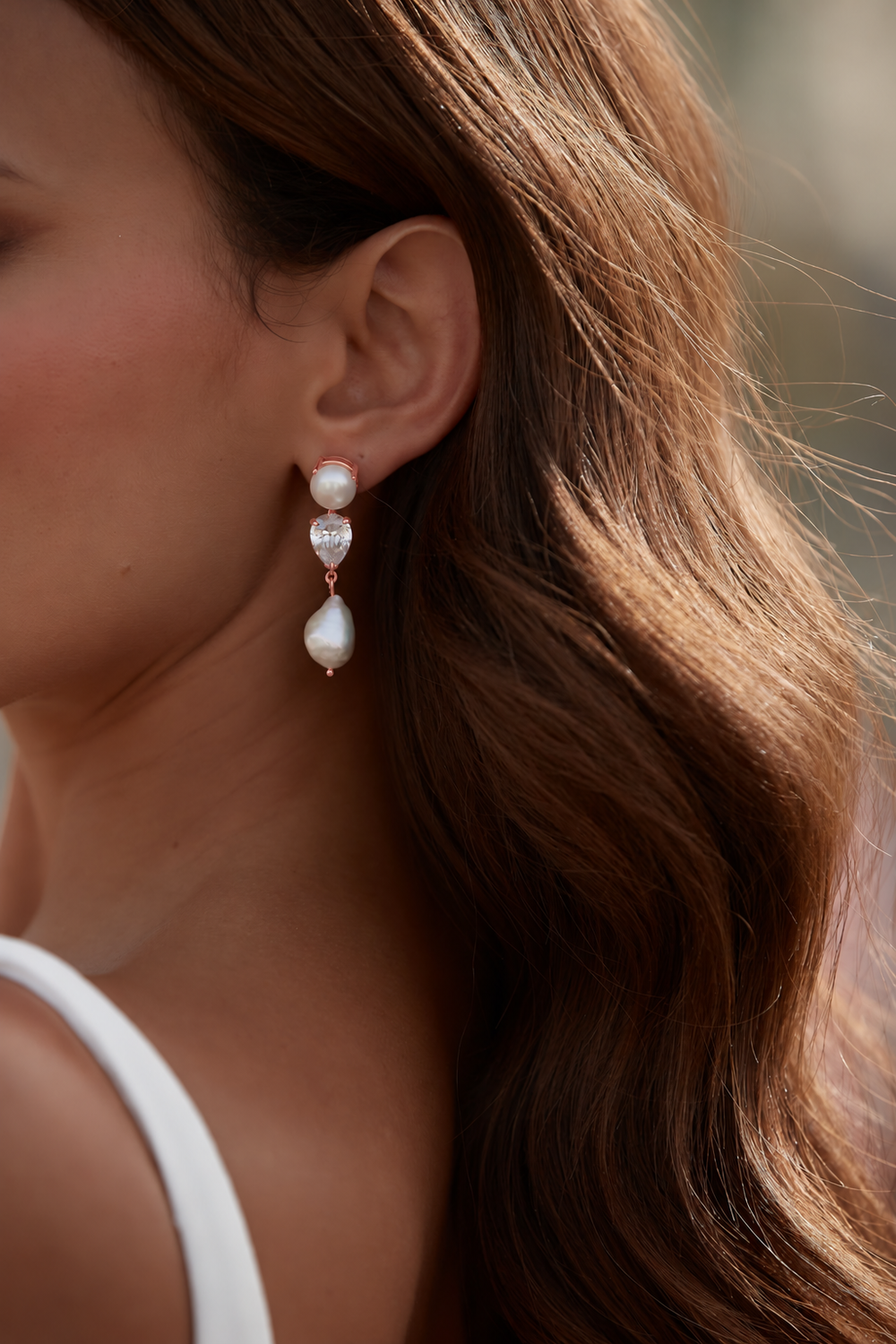 Luxury rose gold pearl crystal drop wedding earrings for the chic modern bride to be.