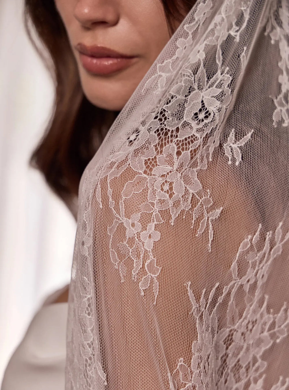 Florence lace bridal veil featuring delicate floral lace trim designed for modern and romantic weddings by Lolaknight