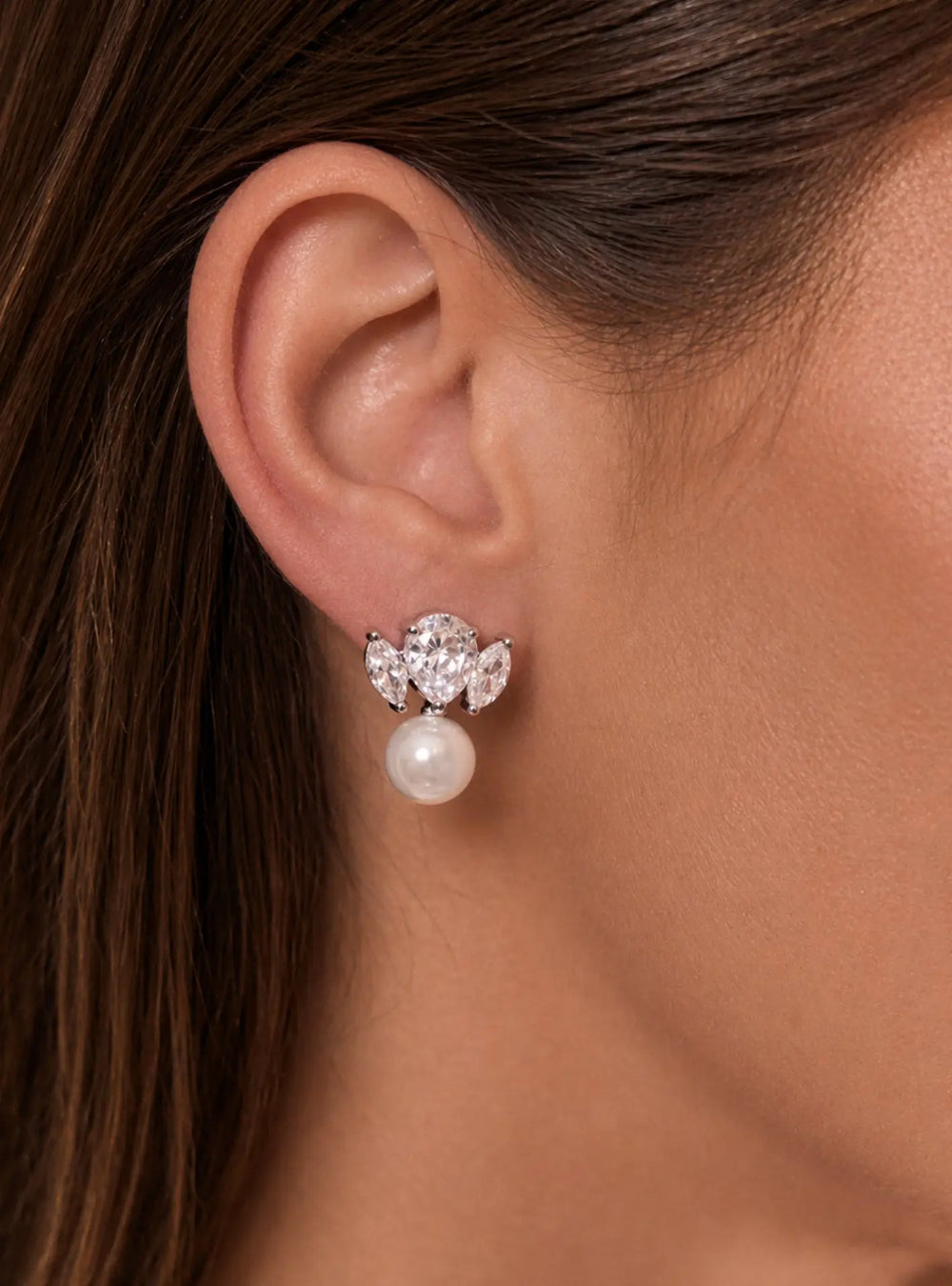Maris statement bridal drop earrings in silver with pear cut crystals and pearl detailing by Lolaknight