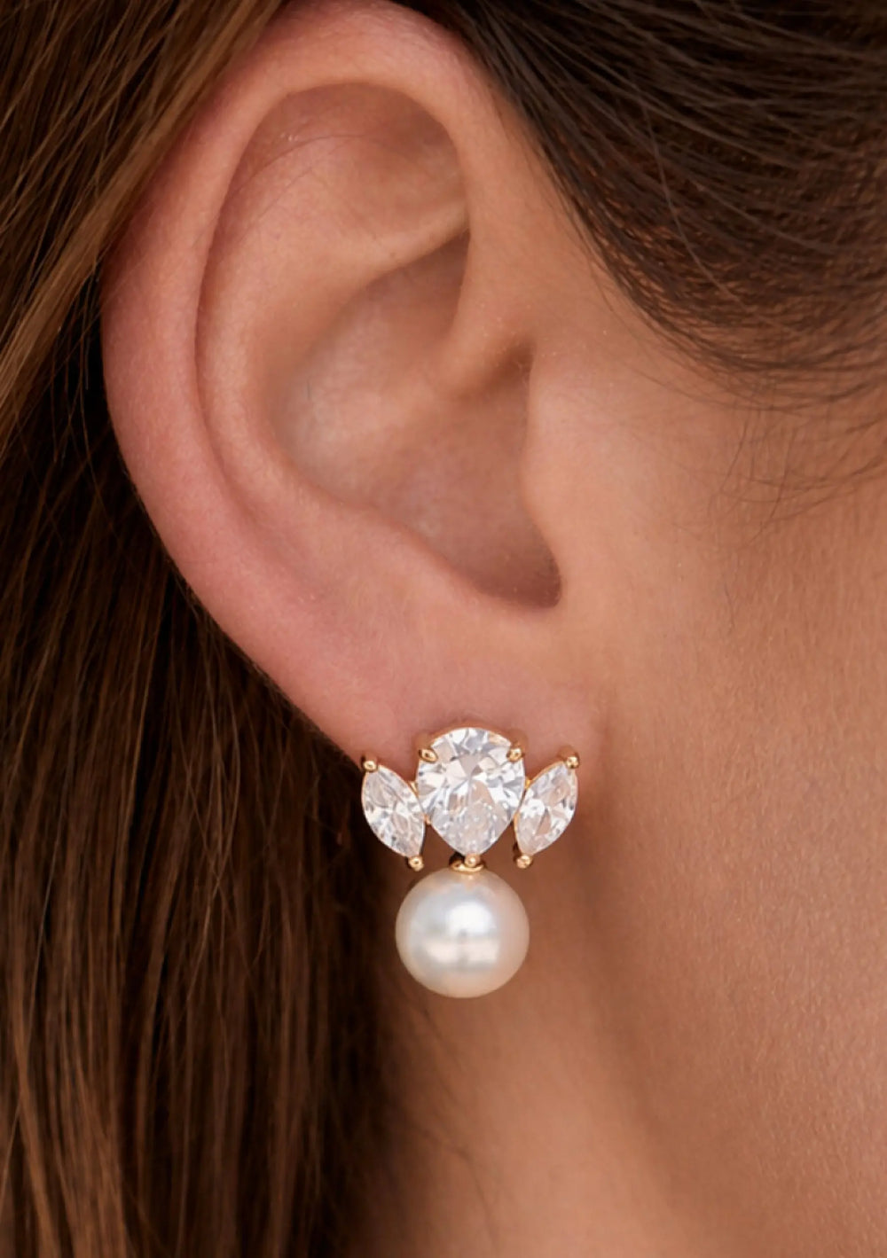Maris statement bridal drop earrings in 18K gold with pear cut crystals and pearl detailing by Lolaknight