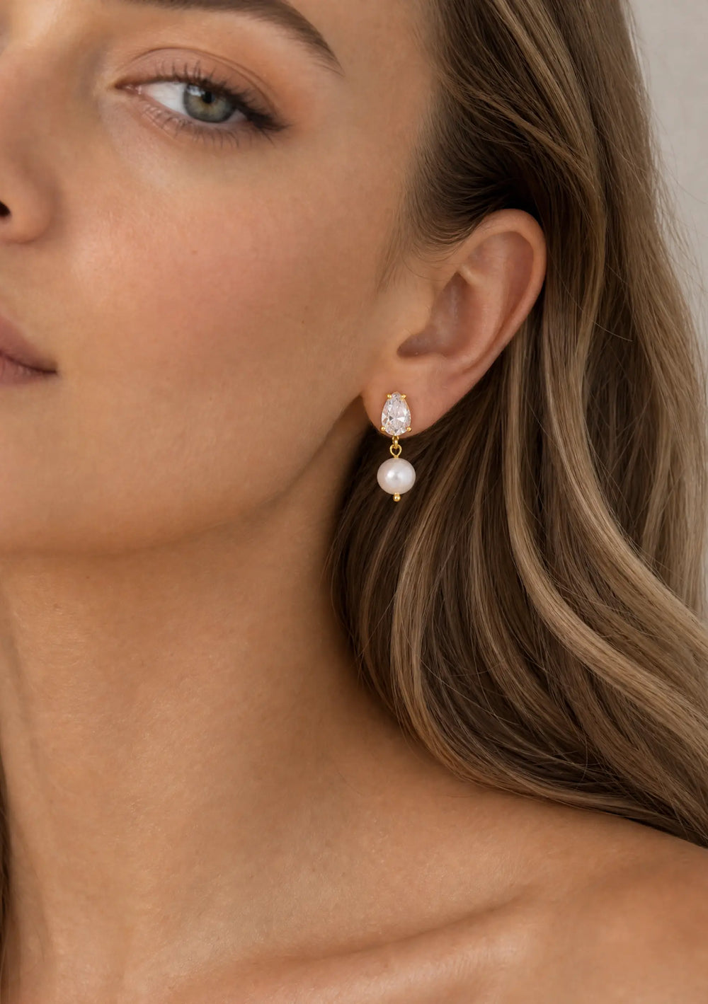 Modern gold pearl drop earrings perfect for wedding day jewellery looks