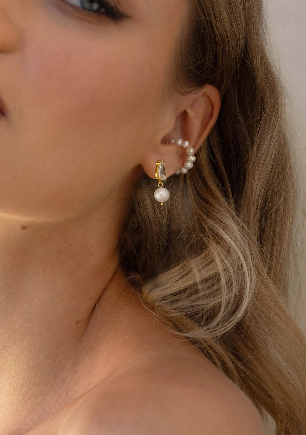Modern gold pearl drop earrings perfect for wedding day jewellery looks