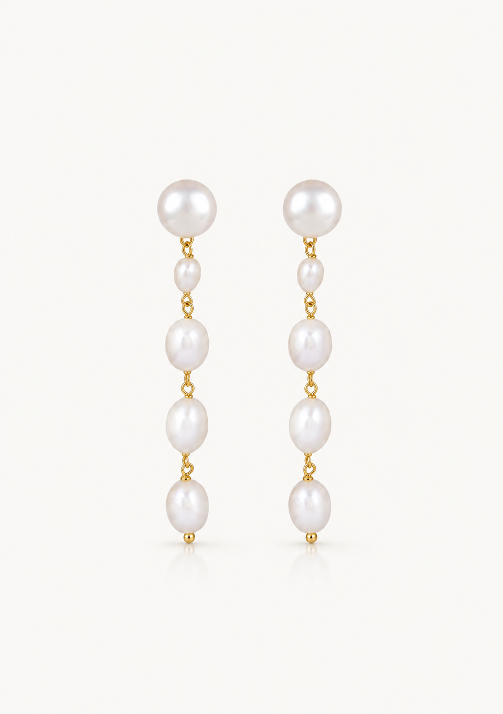 Modern and chic gold and pearl gold bridal earrings for the modern bride to be 