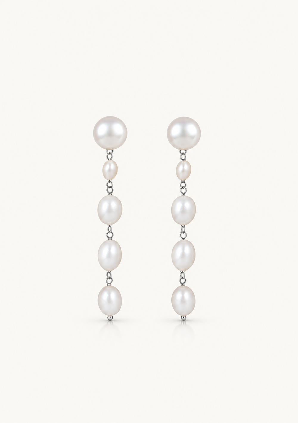 Modern and chic silver and pearl bridal earrings for the modern bride to be 