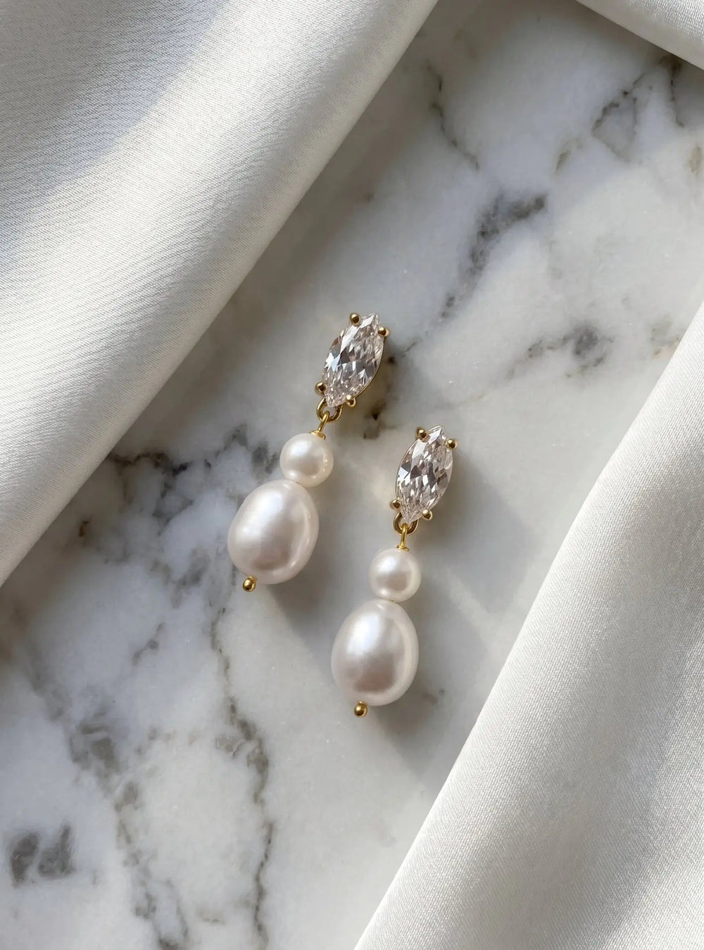 Gold pearl drop bridal earrings with freshwater pearls and elegant wedding styling