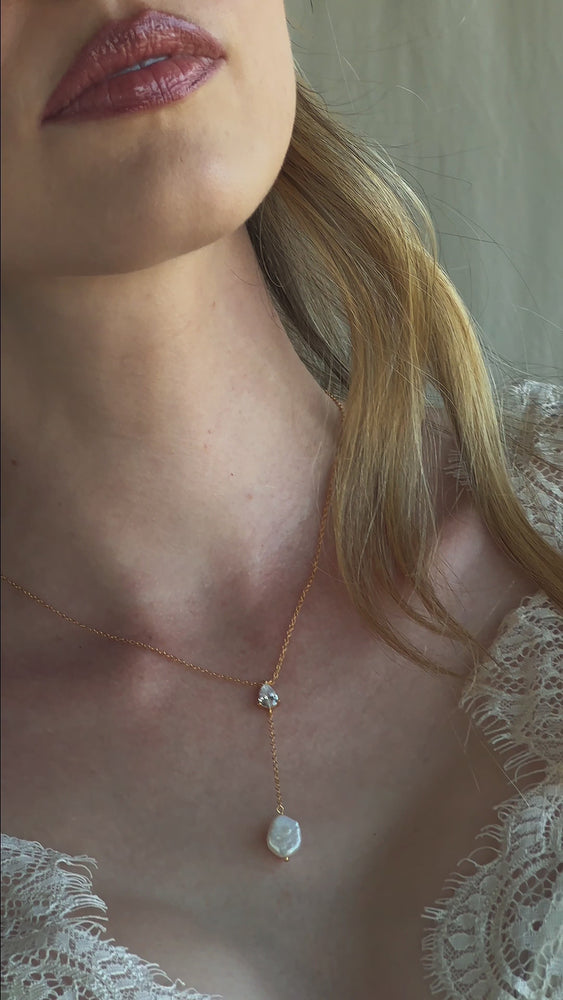 
                  
                    Load and play video in Gallery viewer, ANDI CRYSTAL PEARL NECKLACE 18K GOLD
                  
                